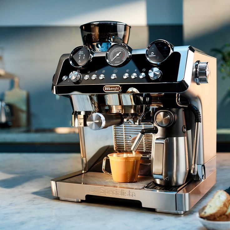 an espresso machine sitting on top of a counter