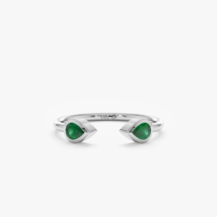 white gold emerald band Green Teardrop Emerald Rings, Green Solitaire Teardrop Jewelry, Teardrop Green Emerald Rings, Classic Green Teardrop Emerald Ring, Elegant Green Teardrop Emerald Ring, Elegant Emerald Ring With Tension Setting For May Birthstone, Elegant Teardrop Emerald Ring May Birthstone, Teardrop Emerald Green Rings, Green Emerald Teardrop Rings