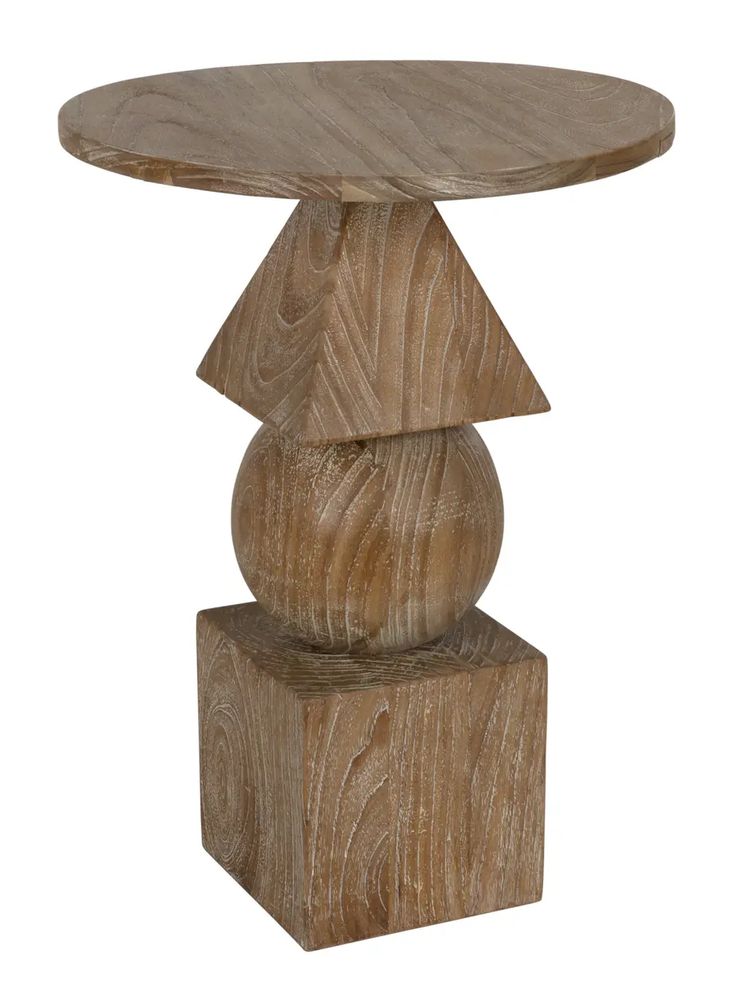 a round wooden table with three stacked wood blocks on the bottom and one in the middle