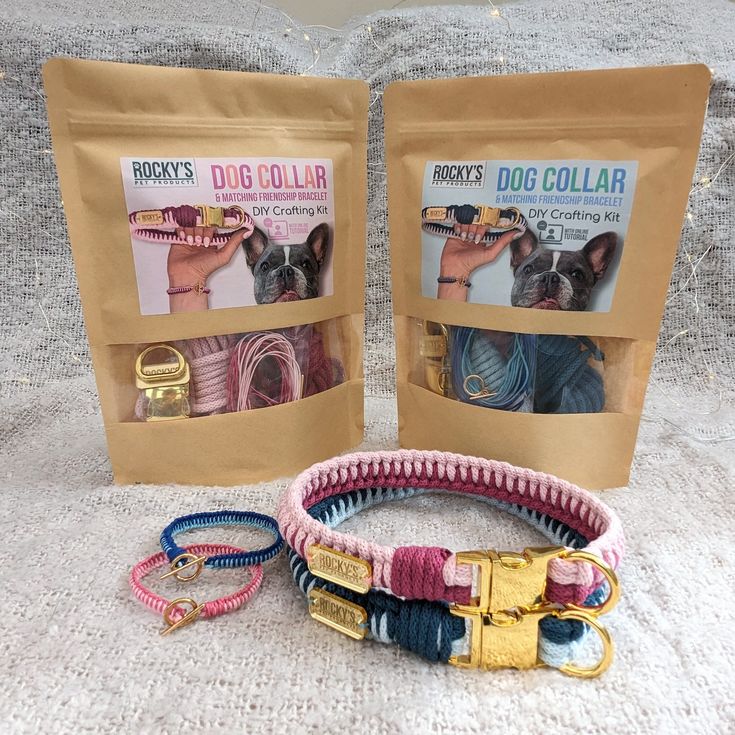 two dog collars and three bracelets are on the couch next to each other