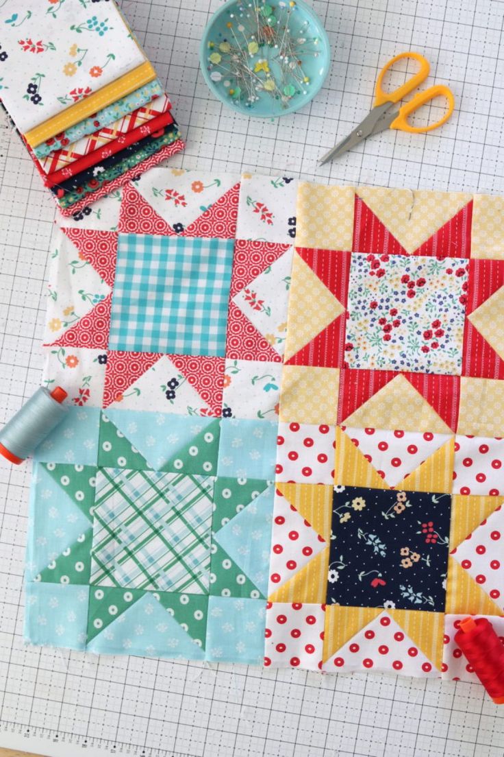 the quilts are laid out and ready to be sewn together on the table