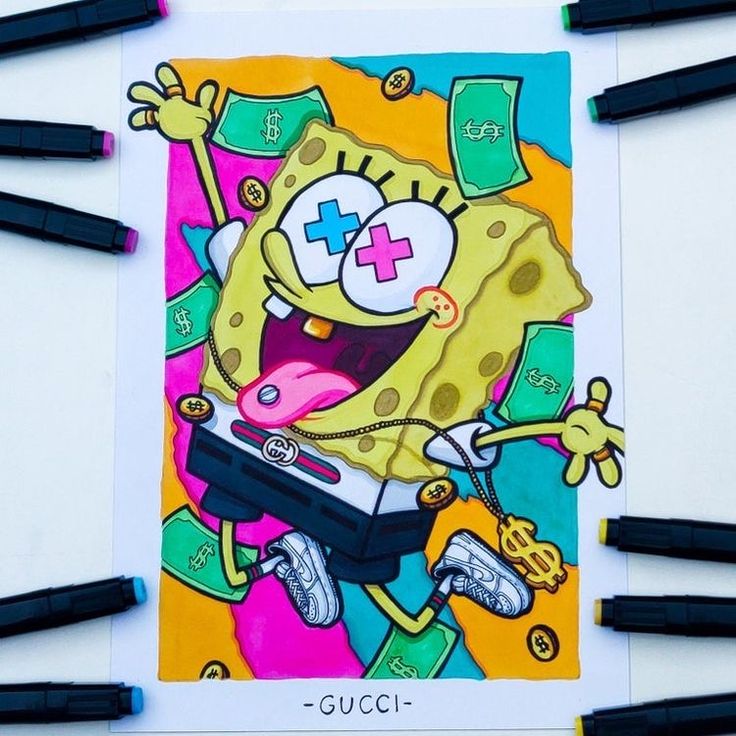 the spongebob drawing is surrounded by crayons