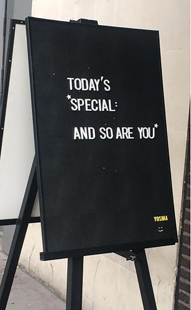 a sign that says today's special and so are you