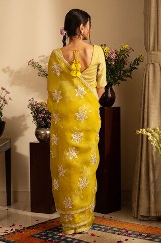 Lemon yellow saree crafted in pure silk organza with phool embroidery. Paired with an unstitched blouse piece and an unstitched petticoat. - Aza Fashions Lemon Yellow Saree, Yellow Saree, Silk Organza, Set Women, Lemon Yellow, Blouse Piece, Petticoat, Aza Fashion, Pure Silk