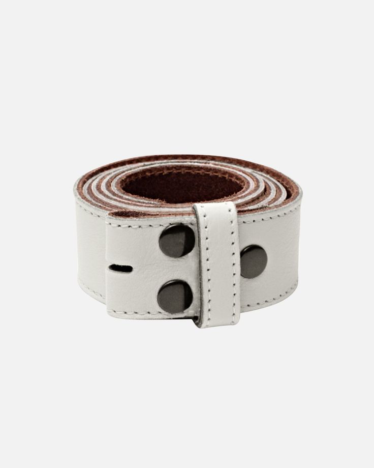 Introducing our Lia soft leather belt strap, a true embodiment of luxury and glamor. Made from premium Italian leather and featuring a sleek minimalist finish, this strap is the perfect accessory to elevate your style game. With its easy-to-use clasp system, you can effortlessly swap out the buckle to create a look that's uniquely you. Style the leather belt strap with any jewel buckle you want and add an eternal glow to your outfit. Explore our Collection of Belt Buckles here to pair with this Adjustable Brown Belt With Silver Buckle, Belt Buckles Men's, Traditional Leather Belt Buckle, Adjustable, Off White Belt, Southwestern Hand-tooled Adjustable Belt Buckles, Luxury Leather Belt With Silver-tone Hardware, Vintage Brown Hand-tooled Belt Buckle, Studded Belt, Western Belts