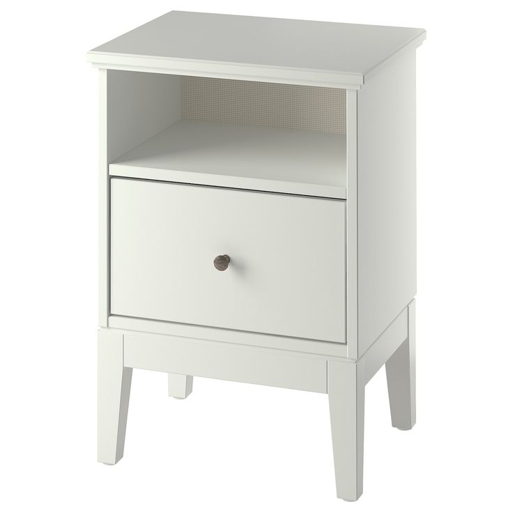 a white night stand with two drawers and one drawer on the bottom, in front of a white background