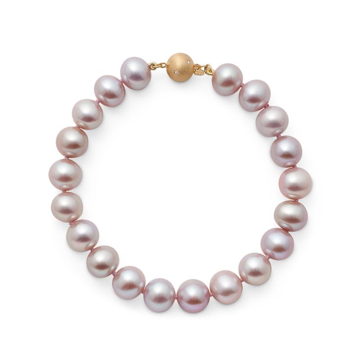 Simple statements of elegance, pearls have been a mainstay in Gump's fine jewelry assortment for decades. Revered for their alluring luster and classic beauty, they are widely recognized as symbols of purity, integrity and wisdom gained through experience. To create this bracelet, each pearl is carefully selected for quality, color and shape. Pink freshwater cultured pearls, 8mm. Diamonds, 0.03ctw. 18-karat yellow gold. 7 1/2" L. Luxury Pearl Bracelet With Charm, Elegant Formal Pearl Chain Bracelet, Elegant Pearl Bracelet For Formal Occasions, Luxury Pearl Drop Bracelet For Formal Occasions, Elegant Pearl Chain Beaded Bracelet For Formal Occasions, Luxury Pearl Chain Bracelet For Formal Occasions, Luxury Pearl Drop Bracelets For Formal Occasions, Pearl Bracelet With Pearl Charm For Formal Occasions, Formal Single Strand Pearl Bracelet