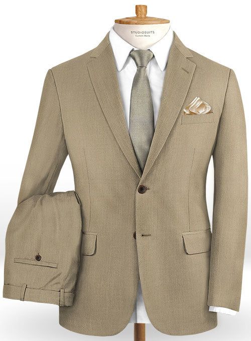 Revive the decades of standout looks with our Scabal Boston Khaki Wool Suit. Crafted from 100% wool, the khaki color of the suit is highly versatile and can make a surprisingly stylish alternative to traditional jacket, creating a flawless ensemble for special events and formal occasions. Simply team it up with a white formal shirt, maroon tie and polished black shoes to complete the look. 
 
 Look Includes  Scabal Boston Khaki Wool Fabric  Two Button Jacket Style  Notch Lapel  Real Horn Brown B Maroon Tie, Grey Tweed Suit, Herringbone Tweed Jacket, White Linen Suit, Green Velvet Jacket, Peaky Blinders Suit, Royal Blue Suit, Traditional Jacket, Blue Chinos