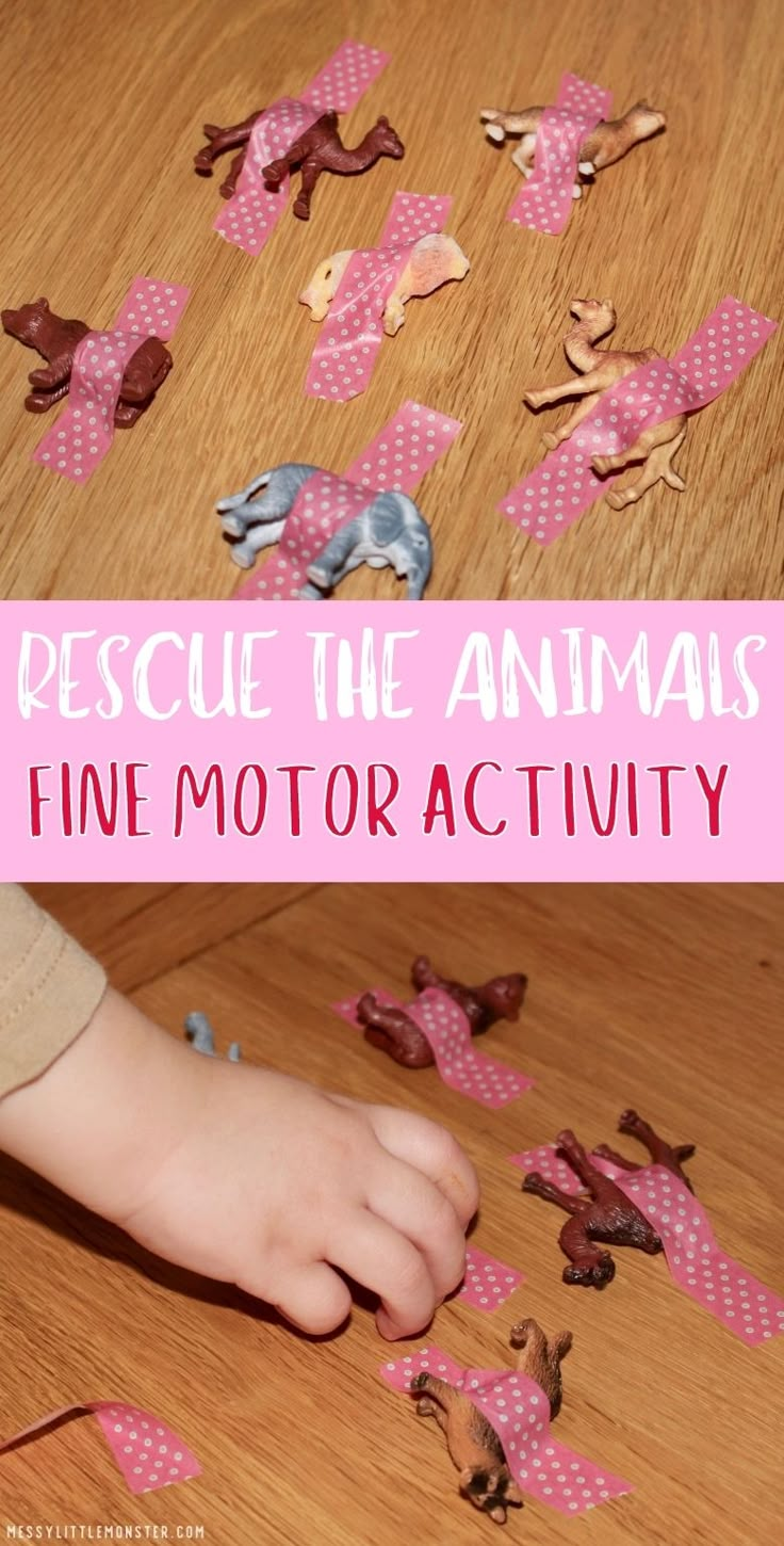 a child is playing with some pink paper animals on the floor and in front of them