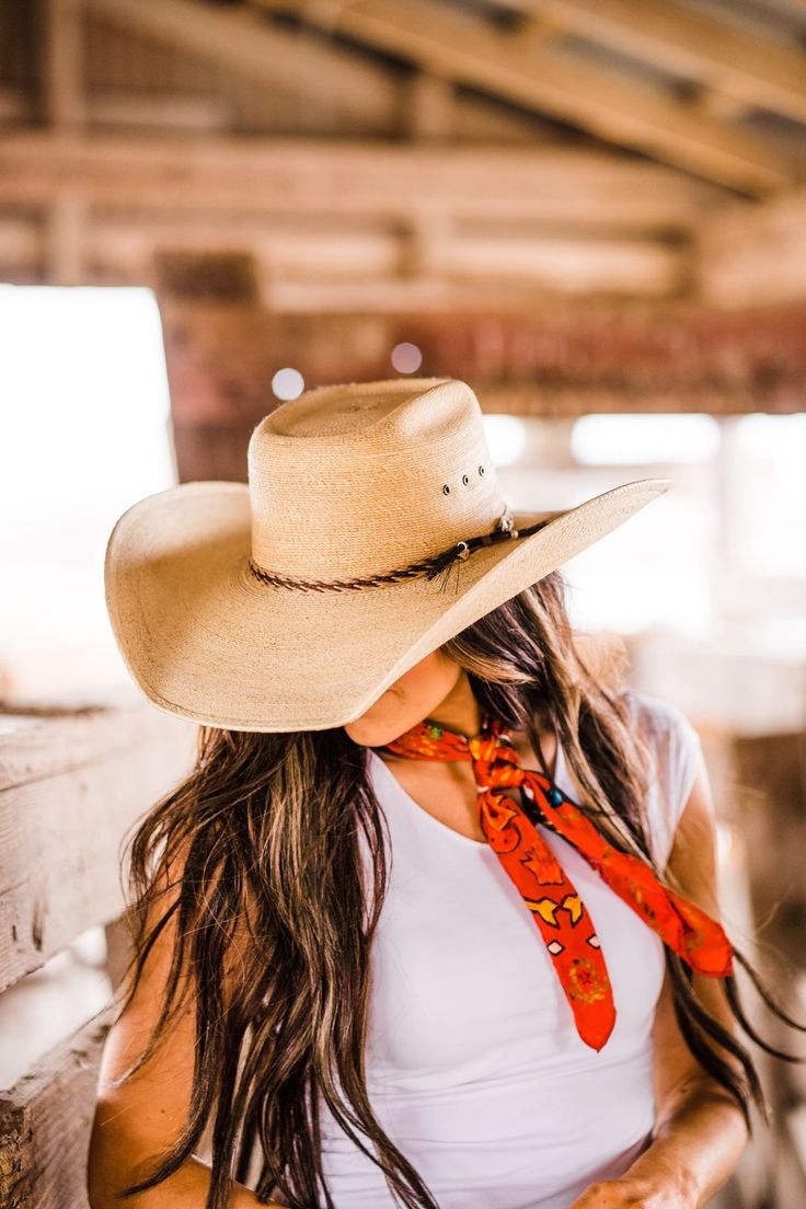 Slip on the head honcho of straw cowboy hats. With a flat top featuring a subtle pinch adding a flavorful taste of contour, this hat embodies everything one wants in a straw cowboy hat. Rope up the competition with American Hat Makers Roper. #americanhatmakers #ahm #americanhats #leatherhats #cowboyhats #cowgirlhats #tophats #sunhats #fedorahats #menshats #womenshats #strawhats #hatstyles #felthats #hatbands #westernhats #outbackhats Womens Straw Cowboy Hat, Straw Cowboy Hats, Cowgirl Hats Western, Sombrero Cowboy, Straw Cowgirl Hat, Cowboy Hats Women, Head Honcho, White Baseball Hat, Brown Cowboy Hat