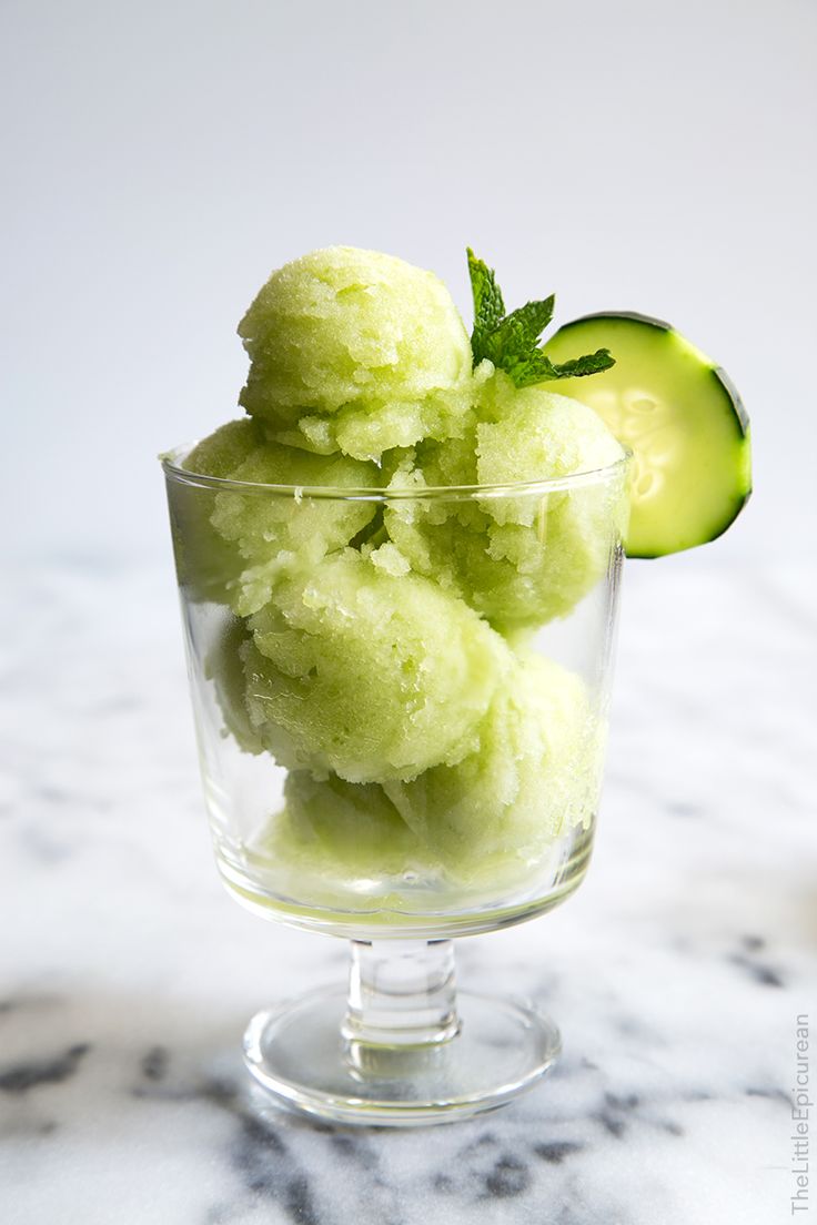 cucumber sorbet in a clear glass with the words cucumber sorbet above it