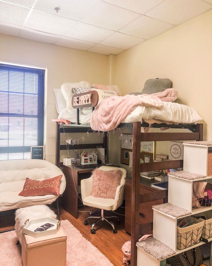 a bedroom with bunk bed, desk and chair