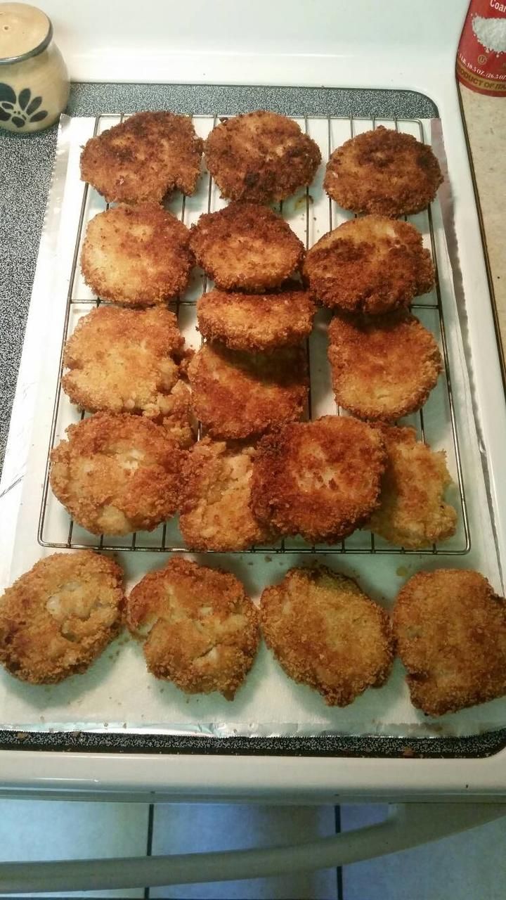 some fried food is sitting on a cooling rack