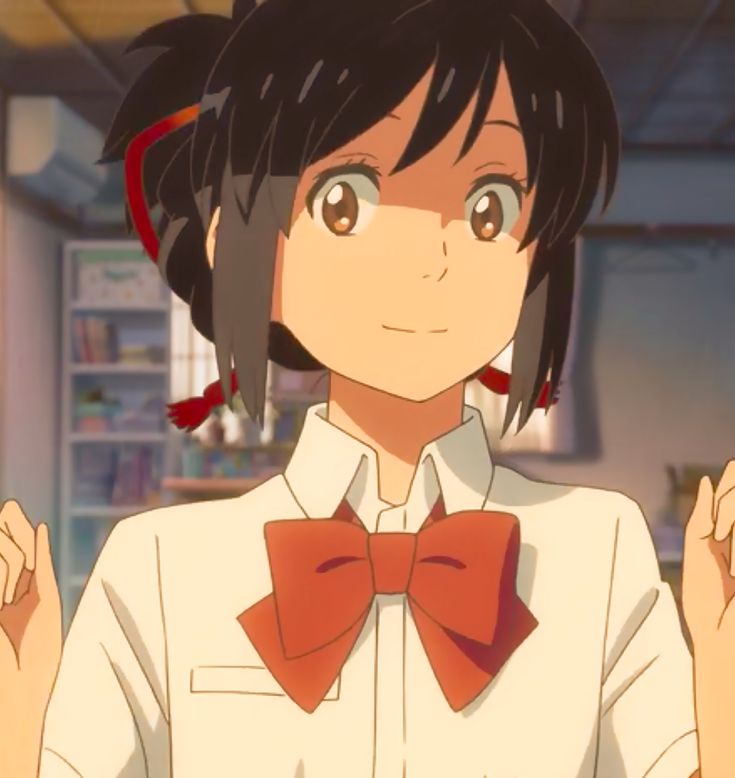 an anime character wearing a white shirt and red bow tie with her hands in the air