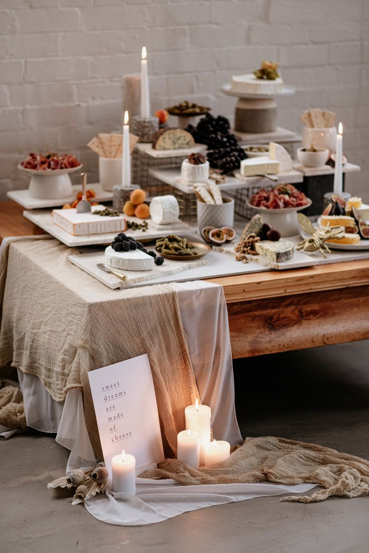 wedding grazing table with modern black and white sign Table Styling Photography, Grazing Table Signage, Grazing Table Styling, Wedding Cheese Board Display, Grazing Table Design, Minimalist Grazing Table, Modern Grazing Table, Retreat Table Decorations, Table Setting For Buffet Wedding