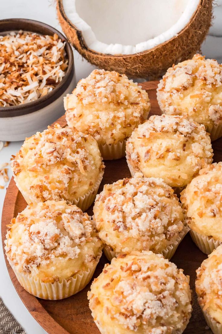 Image of a plateful of toasted coconut muffins. Fall Coconut Dessert, Coconut Cream Muffins, Coconut Breakfast, Coconut Baked Goods, Coconut Milk Muffins, Coconut Extract Recipes, Recipes With Toasted Coconut, Coconut Dessert Recipes, Chocolate Coconut Muffins