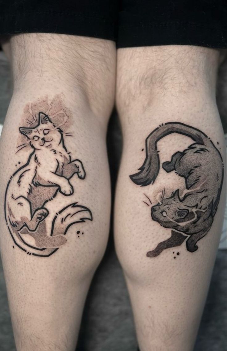 two people with tattoos on their legs, one has a cat and the other has a mouse