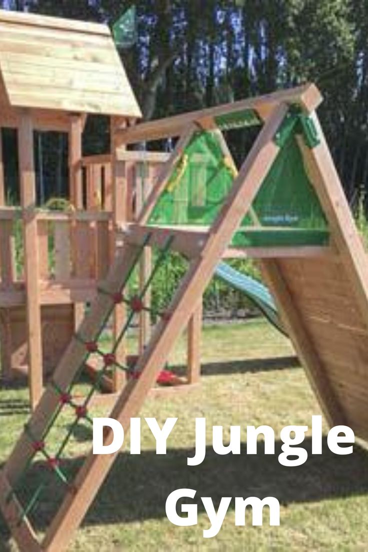 a wooden swing set with the words diy jungle gym