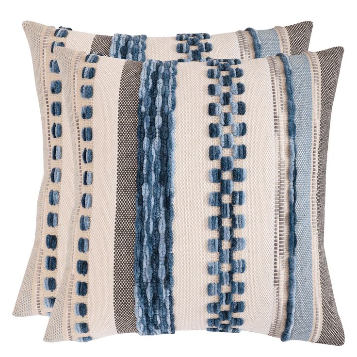 three pillows with blue and white stripes on them