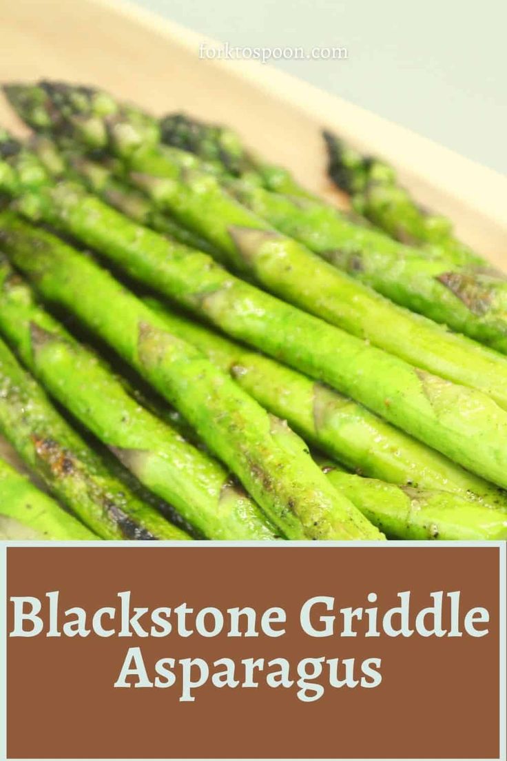 black stone grille asparagus on a cutting board with the title blackstone griddle asparagus