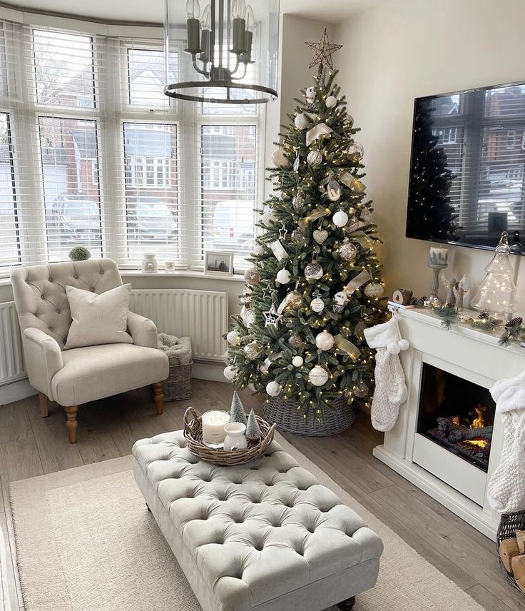 a living room with a christmas tree in the corner