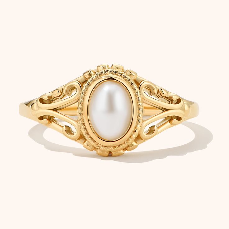 Indulge in a touch of vintage charm with our elegant Vintage Pearl Ring. Crafted with exquisite detailing, this ring features a lustrous pearl set in a classic design. This ring is perfect for those who love timeless and sophisticated pieces, making it a versatile addition to your jewelry collection Vintage Rings Pearl, Pearl Rings Vintage Sales, Vintage Victorian Rings, Elegant Signet Ring With Classic Design, Elegant Wedding Filigree Ring, Classic Pearl White Open Ring, Timeless Pearl Drop Rings For Formal Occasions, Oval Pearl Rings For Formal Occasions, Classic White Rings With Elegant Design