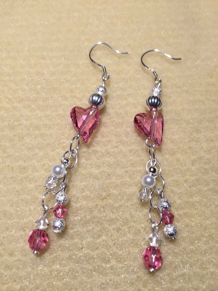 Nickel-free Pink Heart Cut Jewelry, Pink Sterling Silver Heart Bead Earrings, Pink Sterling Silver Heart Beaded Earrings, Pink Heart Beads Sterling Silver Earrings, Sterling Silver Dangle Heart Earrings For Party, Pink Sterling Silver Earrings For Valentine's Day, Pink Double Heart Sterling Silver Earrings, Pink Crystal Earrings For Valentine's Day, Pink Heart-shaped Crystal Earrings For Valentine's Day