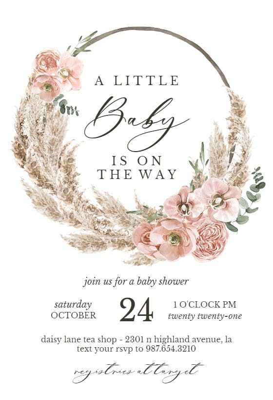 a baby shower is on the way with pink flowers