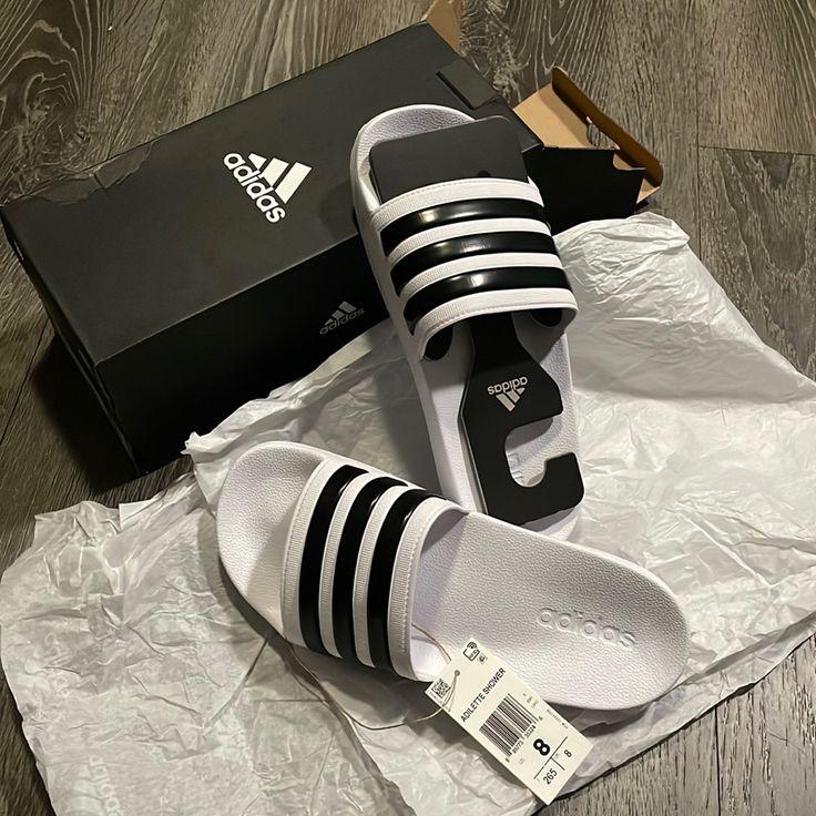 Adidas Adilette Shower White Sandals Us Size 8 (Men) , Fits 9 In Women *Shipped W/ Box *New White Comfortable Adidas Slides, Adidas White Slip-on Sandals, Adidas White Sporty Slides, Adidas White Flip Flops For The Beach, Adidas White Flip Flops For Beach, White Adidas Flip Flops For The Beach, White Adidas Flip Flops For Beach, Adidas White Slide Sandals, Adidas Sporty White Sandals