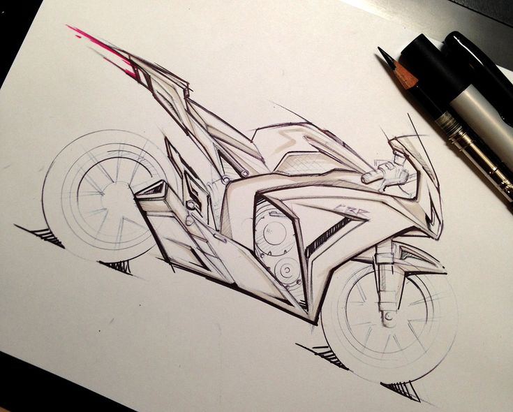 a drawing of a motor bike on paper