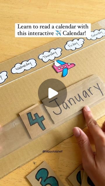 someone is making a calendar for their child to learn how to read the letters and numbers