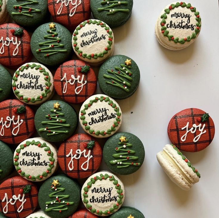 decorated cookies and pastries are arranged in the shape of a christmas tree