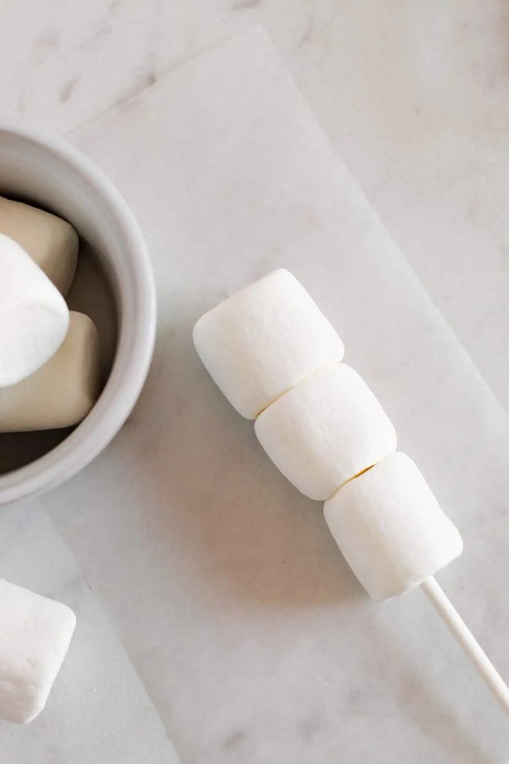 marshmallows in a bowl on a table