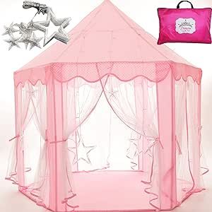 a pink play tent with mosquito netting on the top and side walls, in front of a red bag