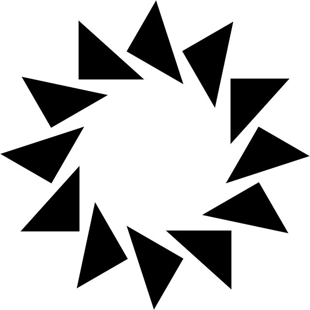 an abstract black and white design with triangles in the center, forming a circular shape