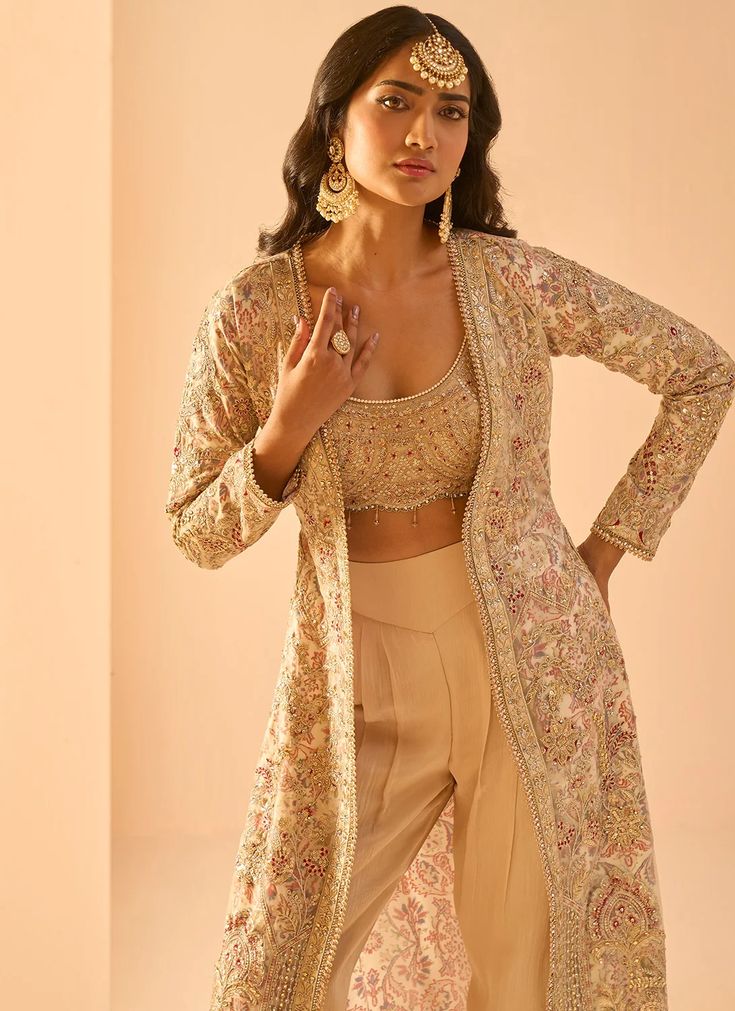 Golden Beige Embroidered Crop Jacket Set – Lashkaraa Long Sleeve Choli With Intricate Embroidery, Traditional Drape Nehru Jacket With Intricate Embroidery For Party, Glamorous Embroidered Set With Traditional Drape, Nehru Jacket With Intricate Embroidery For Party, Silk Outerwear With Intricate Embroidery, Glamorous Floral Embroidered Sets For Reception, Glamorous Festive Embroidered Sets, Glamorous Sets With Floral Embroidery For Reception, Festive Party Outerwear With Intricate Embroidery