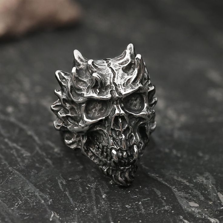 Flaming skull designs are quite trendy nowadays because of their unique look and symbolic meaning.... Halloween Black Skull Ring, Black Skull Ring For Halloween, Black Punk Style Skull Ring Collectible, Black Punk Skull Ring Collectible, Punk Skull Ring For Halloween, Black Metal Skull Ring, Black Symbolic Skull Ring For Halloween, Halloween Skull Print Ring As A Gift, Symbolic Black Skull Ring For Halloween