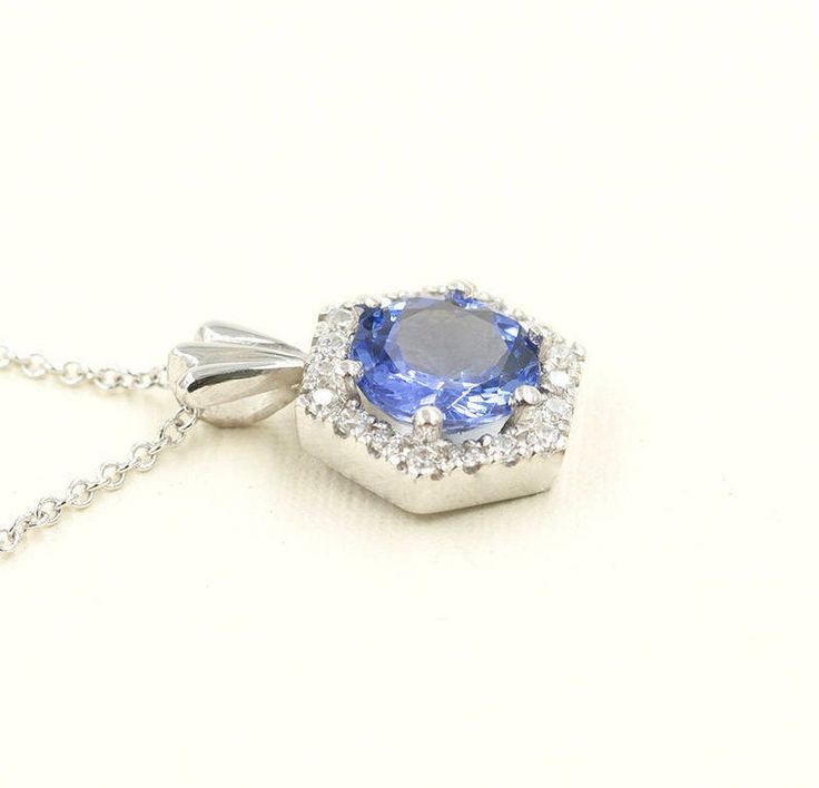 ◈ Diamond Fine Jewelry ◈ ♥This stunning necklace features 7mm Natural Tanzanite and 0.16 round cut diamond. This high quality diamond can be beautifully set in a solid 14k white gold. This Necklace is perfect for everyday use and can be a lovely gift for any occasion!♥ Tanzanite is a gemstone that fulfills the traits of beauty, durability, and rarity. The gemstone is also believed to help recover from any severe illness and severe amounts of stress. ◈ Item Details ◈ --- Handmade in United States Hexagon Brilliant Cut Fine Jewelry, Fine Jewelry Hexagon Brilliant Cut, Hexagon Brilliant Cut Jewelry For Formal Occasions, Fine Jewelry With Hexagon Brilliant Cut, Formal Hexagon Brilliant Cut Jewelry, Brilliant Cut Tanzanite Gemstones As Gift, Brilliant Cut Tanzanite Gemstones For Gift, Formal White Gold Octagon Necklaces, Elegant Octagon Gemstone Necklace