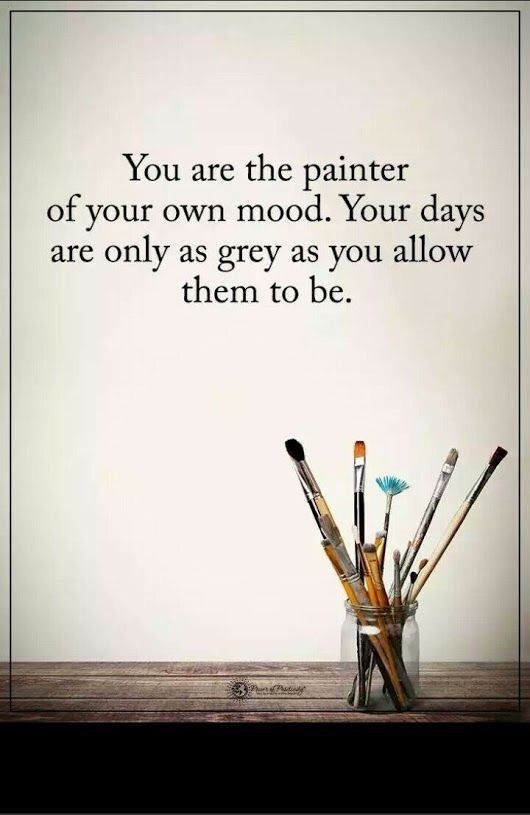 some paintbrushes are in a glass vase on a table with the words you are the painter of your own mood