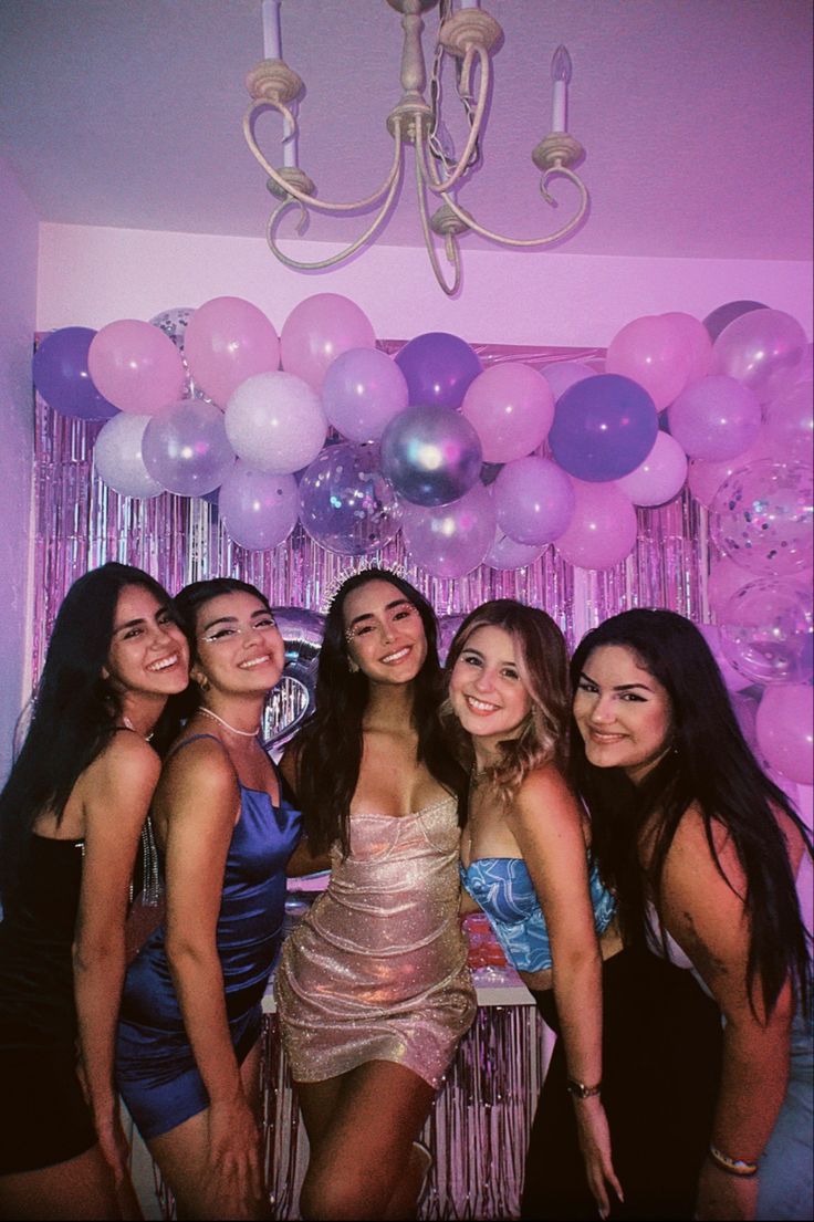 Group of girlfriends posing for a picture on a disposable camera. Euphoria vibe in the back with pink, purple, and silver balloon arc and glitter Purple Pink And Silver Birthday Party, Purple And Pink Themed Birthday Party, Pink Purple Silver Party, Purple Balloons Birthday, Euphoria Birthday Party Outfits, Euphoric Party Outfit, Birthday Outfit With Friends, 18th Birthday Party Ideas Euphoria, 13th Birthday Party Outfit Ideas