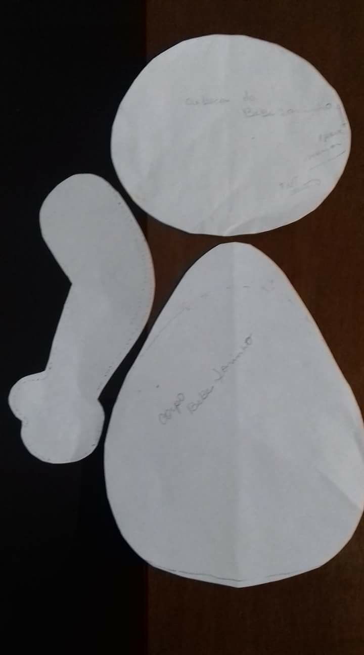 two pieces of white paper with writing on them sitting next to each other in front of a black background