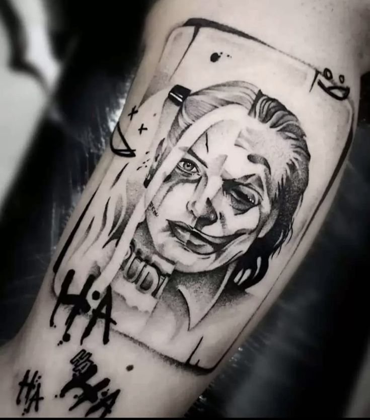 a black and white photo of a clown on the arm