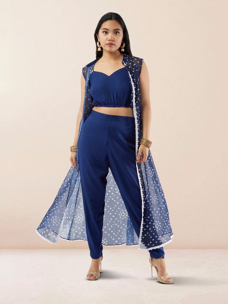 Step out in style with our Vibrant Verve Blue Bandhani Chiffon three Piece Suit. This elegant Indo Western ensemble features a beautiful blue Bandhani design on flowing chiffon fabric, exuding a perfect blend of traditional and contemporary charm. The three-piece suit includes a top, bottom, and dupatta, offering versatility and sophistication for various occasions. Care Instructions: Dry clean recommended to maintain the fabric's quality and colors. Three Piece Design For Women, Three Piece Dress For Women, Three Piece Suit Women's, Three Piece Dress, Bandhani Design, Ethnic Wear Indian, Indo Western Dress, Western Dress, Three Piece Suit