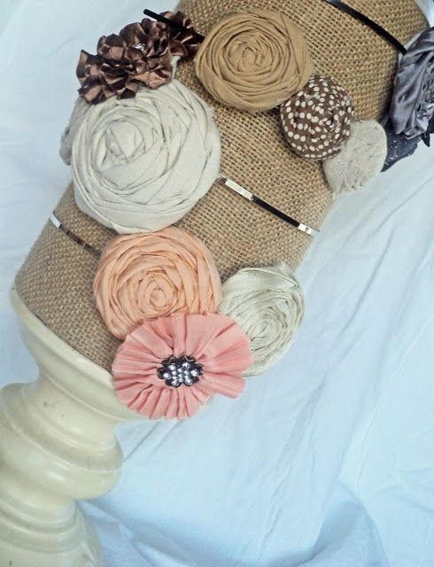 the headbands are decorated with fabric flowers