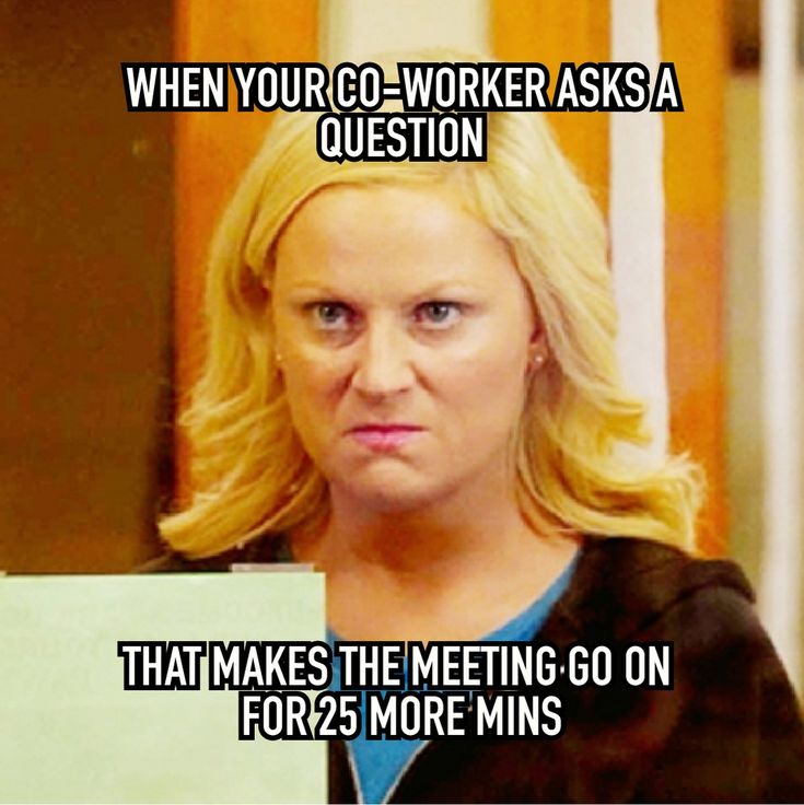 a woman holding a sign with the caption when your co - worker asks a question that makes the meeting go on for 2 more minutes