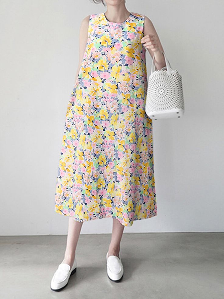 Calico Sleeveless Round Neck Print Dress Multicolor Casual Sleeveless Dress For Spring, Casual Multicolor Floral Print Sleeveless Dress, Spring Sleeveless Midi Sundress, Casual Sleeveless Dress For Spring Daywear, Sleeveless Floral Print Maxi Dress For Daywear, Casual Sleeveless Knee-length Dress For Spring, Floral Print Sleeveless Dress For Daywear, Casual A-line Sleeveless Dress For Spring, Sleeveless Midi Dress For Day Out In Spring