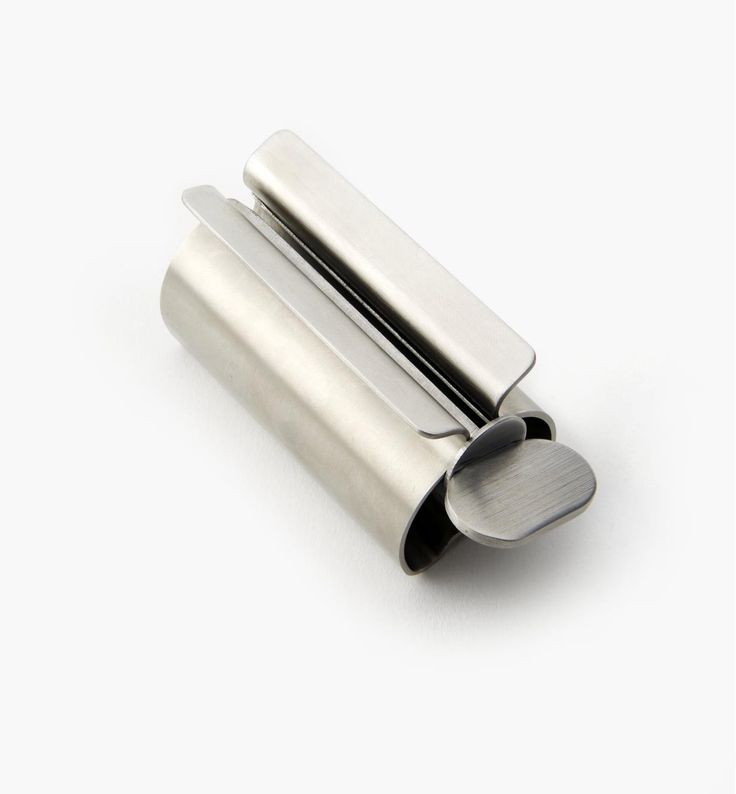 two stainless steel rollers on a white background, one is open and the other is closed