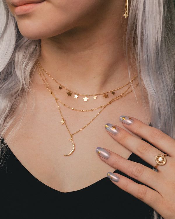 This 14K gold Saturn Chain features 1.7mm faceted bead elements. A unique, modern chain that will become a staple in your wardrobe. NECKLACE DETAILS: Length: 16 Inches & 18 Inches Millimeter: 0.90 Closure: Lobster Average Weight (g): 16" is 1.67 grams; 18" is 1.84 grams Available in 14K Yellow Gold ***These necklaces have a 4 week lead time. If you need your necklace sooner than that, please contact us prior to ordering to verify if that's possible.*** | Faceted Bead Saturn Chain Necklace In 14K Yellow Gold Ring - by Staghead Designs - Unisex Adjustable Celestial Clavicle Chain Jewelry, Celestial Clavicle Chain For Jewelry Making, Celestial Pendant Jewelry With Clavicle Chain, Celestial Clavicle Chain Pendant Jewelry, Adjustable Celestial Gold-plated Jewelry, Celestial Charm Necklace In Yellow Gold With Delicate Chain, Delicate Chain Jewelry For Layering, Delicate Beaded Chain Jewelry For Gift, Celestial Style Yellow Gold Tarnish Resistant Jewelry