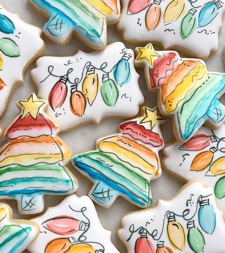 some decorated cookies are sitting on a table