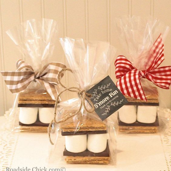 small marshmallows are wrapped in cellophane and tied with ribbon